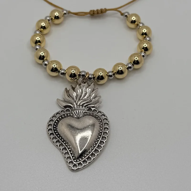 Pulsera de bolas doradas con Sagrado Corazón