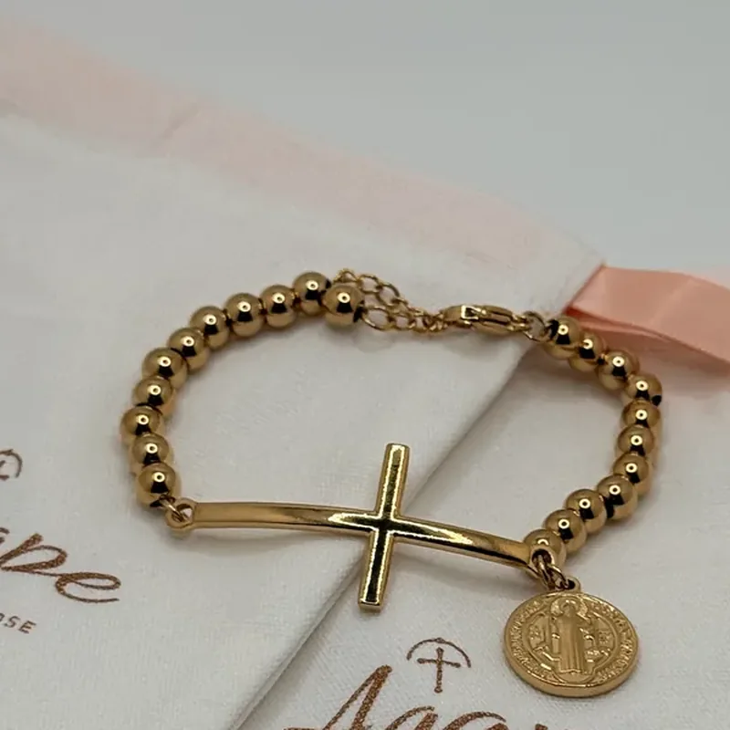 Bead bracelet with sideways cross