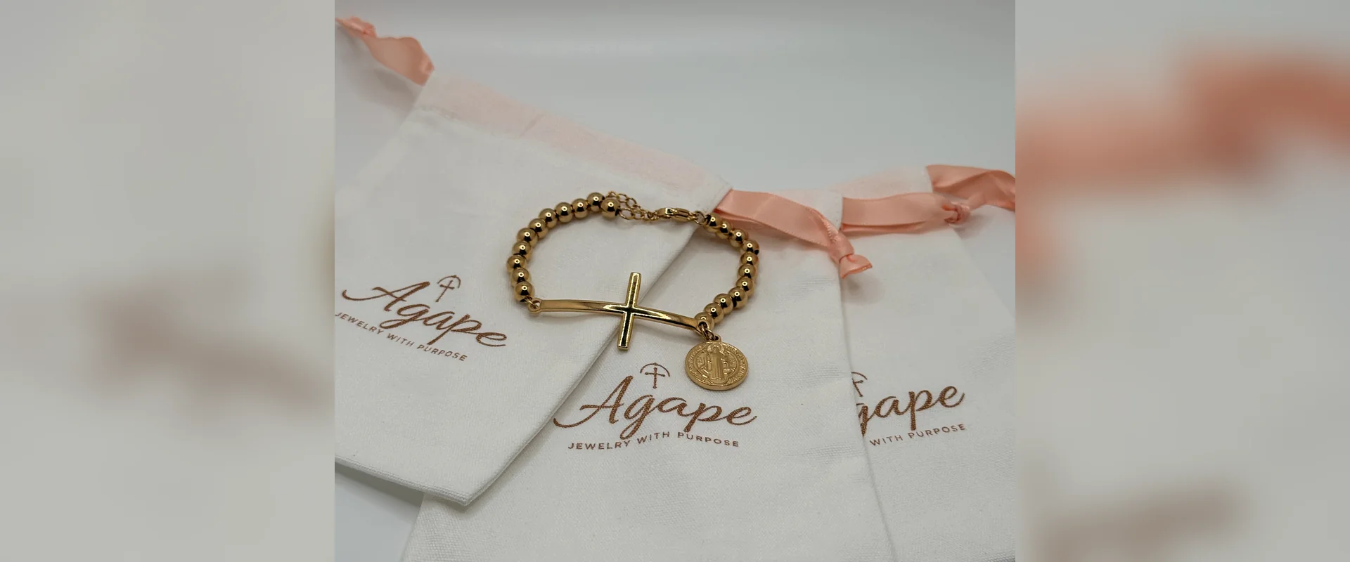 Bead bracelet with sideways cross